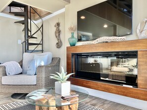 Flat-screen TV, fireplace
