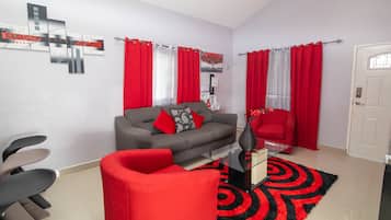 Premium Villa, 2 Bedrooms, Garden View | Living room | 55-inch LCD TV with digital channels, TV, DVD player