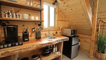 Fridge, microwave, stovetop, coffee/tea maker