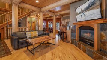 Télévision, cheminée, baby-foot