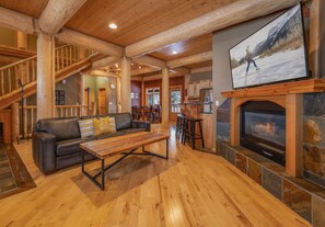 Una televisión, una chimenea, un futbolín