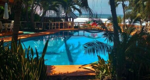 2 outdoor pools, open 9:00 AM to 9:00 PM, pool loungers
