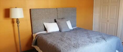 Comfort Suite, 1 Bedroom, Executive Level | 1 bedroom, in-room safe, blackout drapes, iron/ironing board