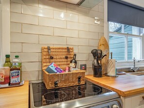 Astianpesukone, syöttötuoli