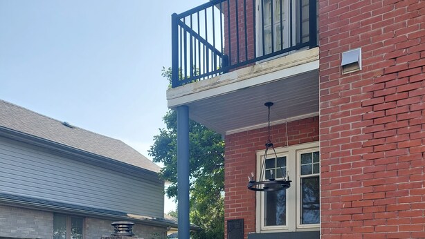 A barbecue area with a brick oven, grill, and a sign that reads "GOOD FOOD GOOD WINE". - Nicklin House (Leamington)