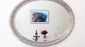 A framed picture of a coastal city on a white wall. - Apartments L&M - One Bedroom Apartment with Terrace (Dubrovnik)