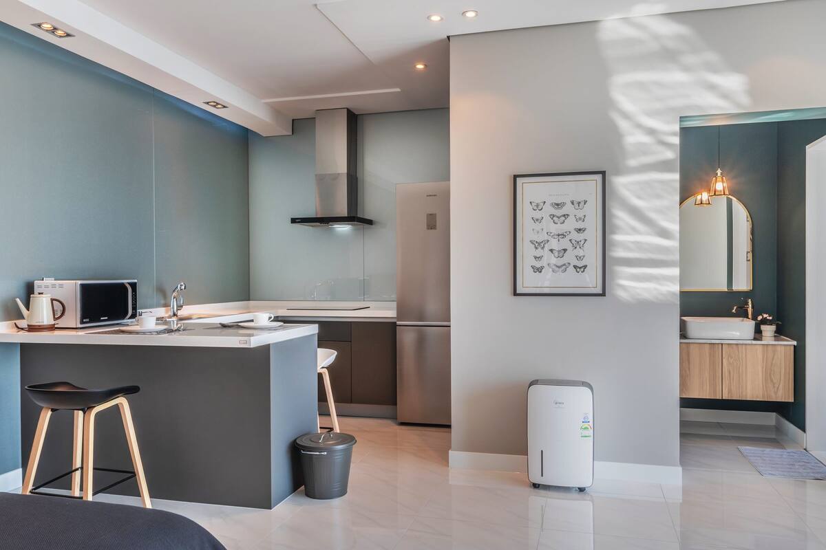 room (a_102) | private kitchenette | full-sized fridge, microwave, stovetop, electric kettle