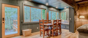 Classic forest cabin on Still Creek with private hot tub & wood fireplace
