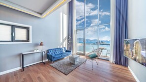 Habitación (C_201) | Área de sala de estar | Smart TV y piso con calefacción 