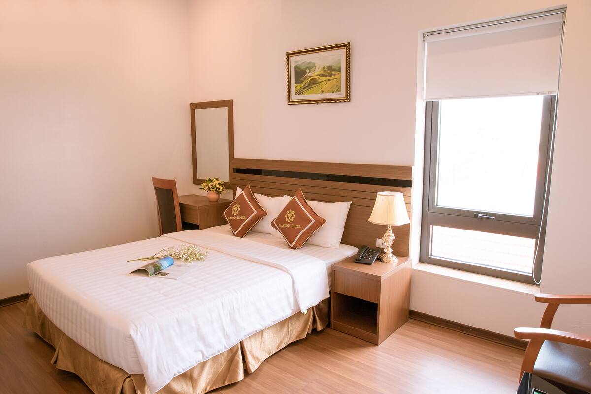 Deluxe Double Room, City View | Minibar, in-room safe, desk, blackout drapes