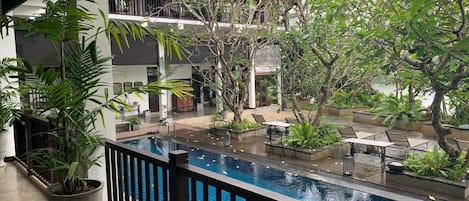 Outdoor pool, pool umbrellas, pool loungers