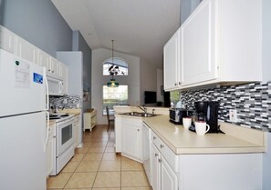 Family Villa, Garden Area | Private kitchen | Stovetop, dishwasher, cookware/dishes/utensils - Ffv8434ha - Southern Dunes - 4 Bed 3 Baths Villa (Haines City)