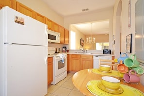 Family Townhome, Garden Area | Private kitchen | Stovetop, dishwasher, cookware/dishes/utensils
