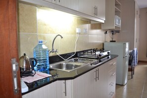 Deluxe Studio Suite | Private kitchenette
