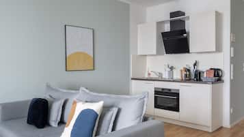 Suite XL with sofa bed | Living area | 101-cm flat-screen TV with digital channels, TV