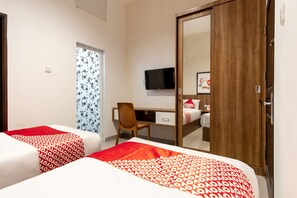 Standaard Twin kamer | Een bureau, gratis wifi, beddengoed