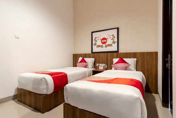 Standaard Twin kamer | Een bureau, gratis wifi, beddengoed