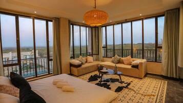Superior Suite | 1 bedroom, laptop workspace, blackout curtains, free rollaway beds
