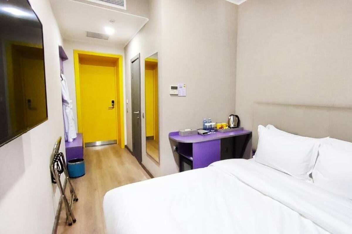 Ropa de cama de alta calidad y minibar 