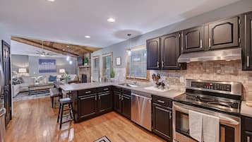 House (2 Bedrooms) | Private kitchen | Fridge, microwave, oven, stovetop