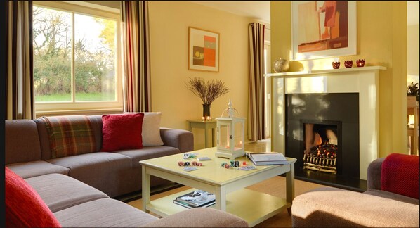 Cottage | Living room | LCD TV, fireplace - Dunkerron Woods 4 bed 4019 (Kenmare)