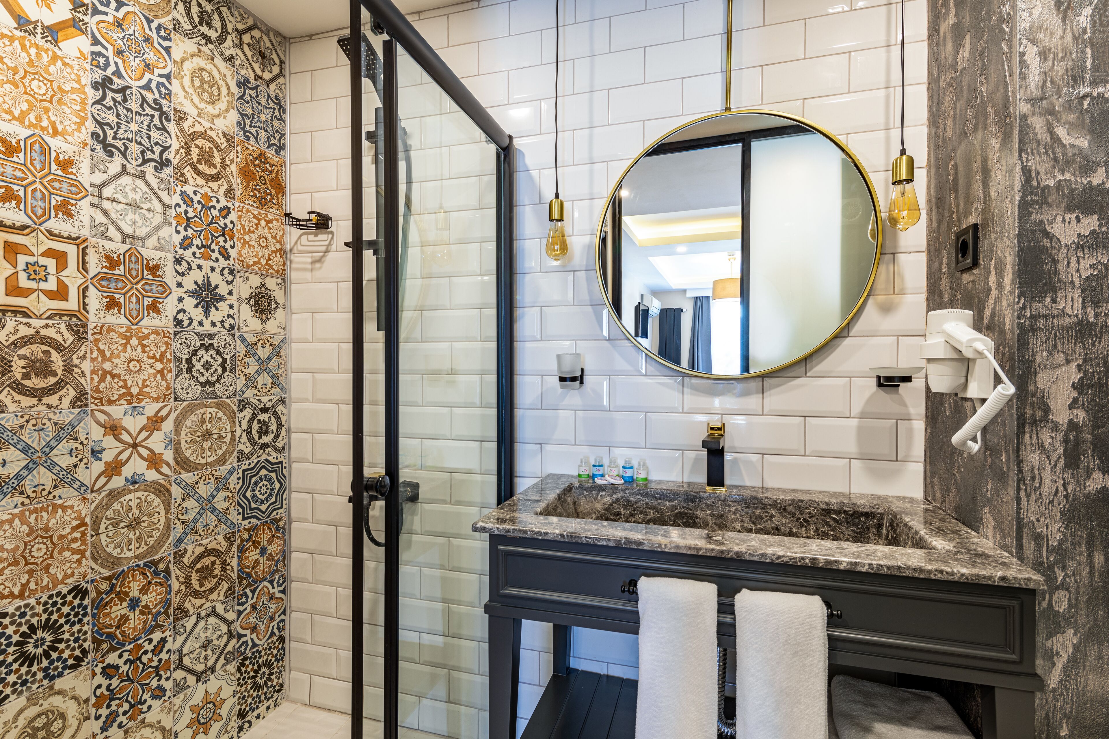 shower, hair dryer, slippers, towels