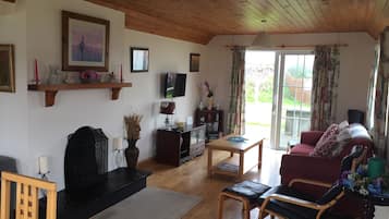 Casa de campo | Sala de estar | Televisión LCD y chimenea