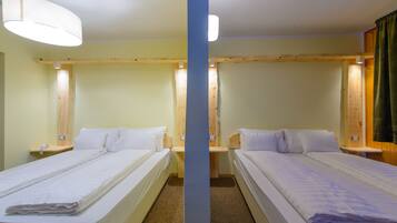 Habitación cuádruple clásica | Caja de seguridad en la habitación, wifi gratis y ropa de cama