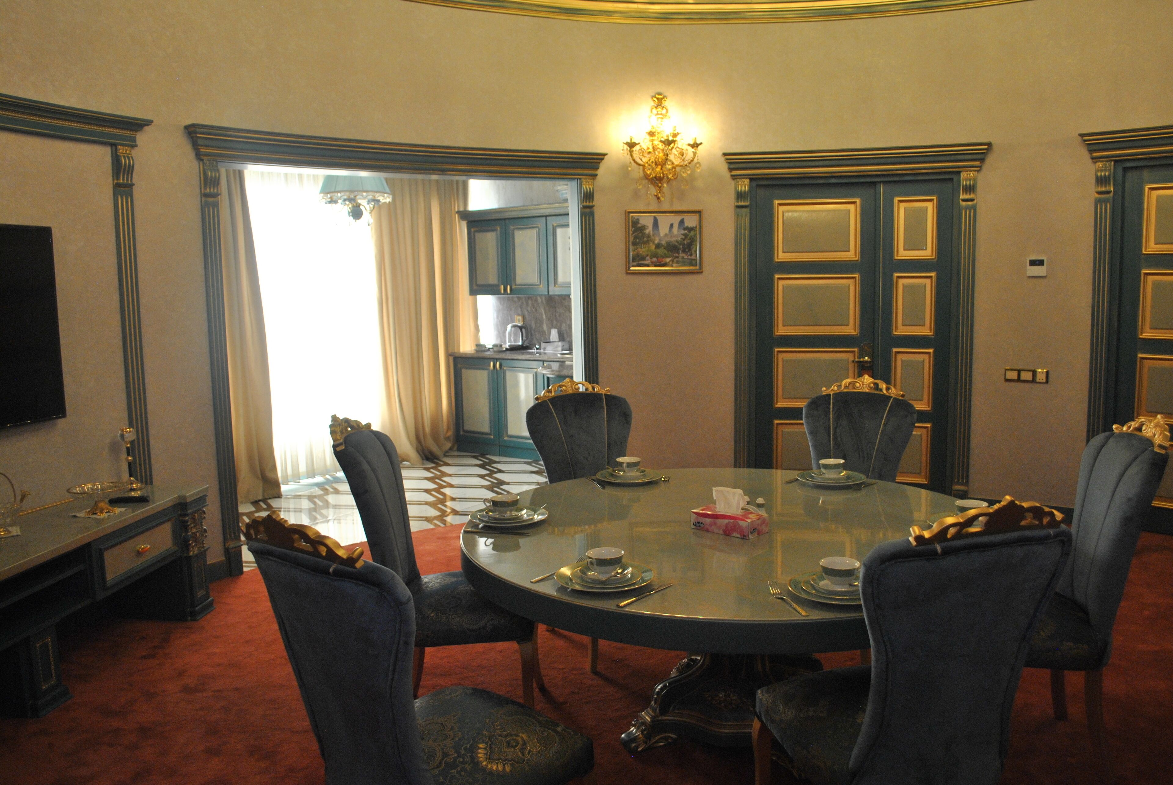 elite apartment | living area | flat-screen tv, heated floors