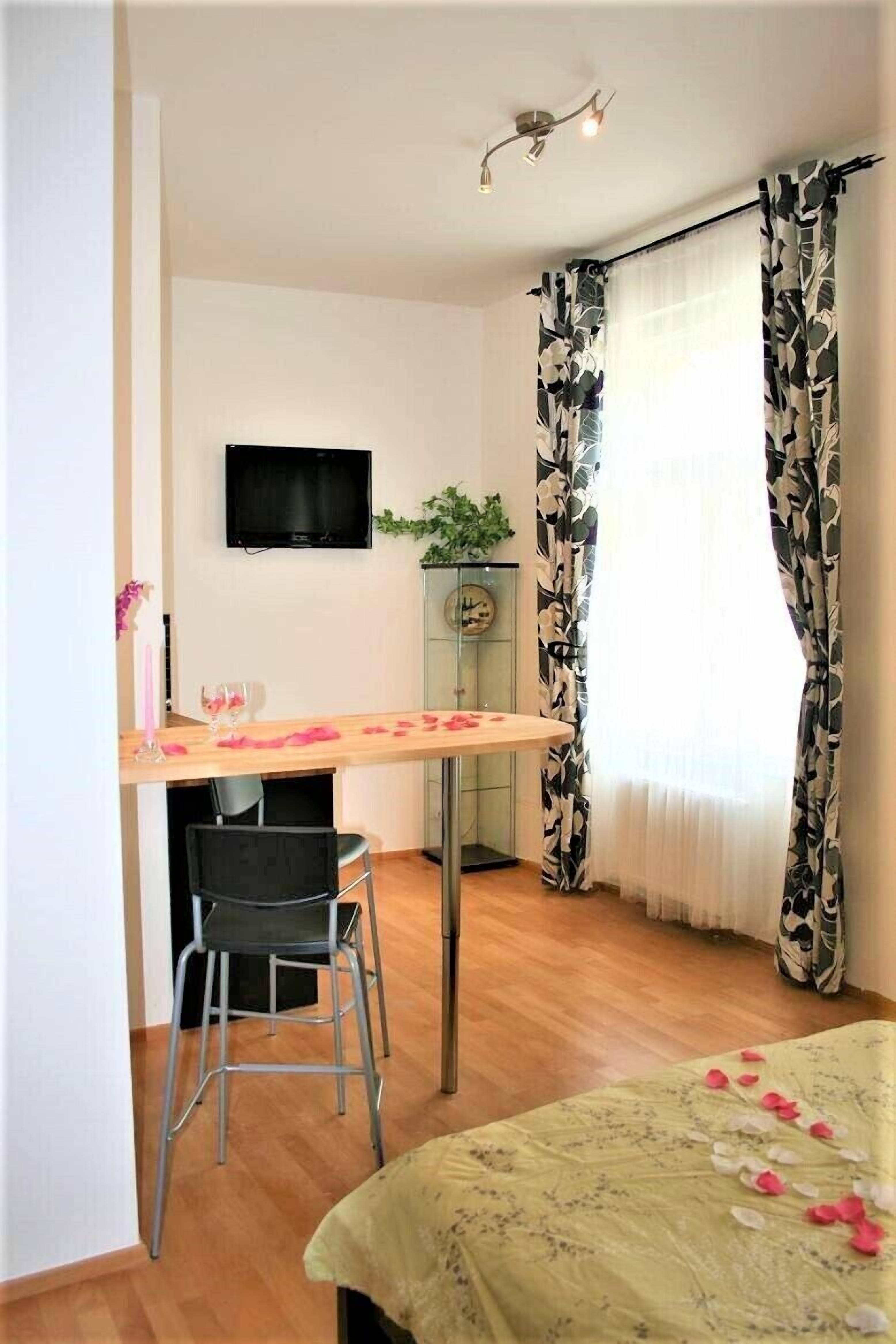 Premium Studio | Desk, laptop workspace, iron/ironing board, travel crib