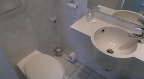 Shower, towels, toilet paper