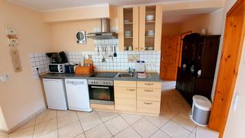 Classic Apartment, 2 Bedrooms | Private kitchen | Fridge, microwave, oven, stovetop