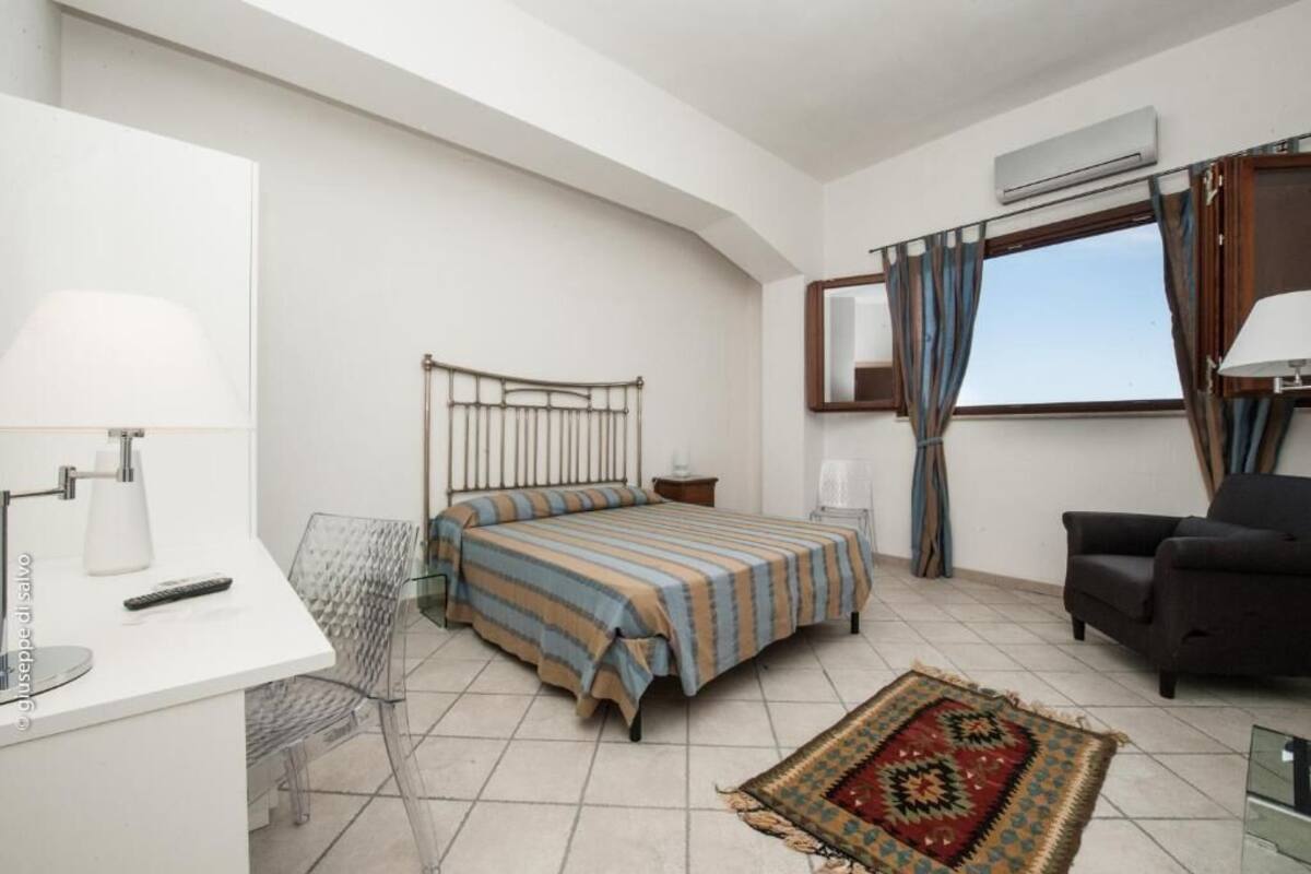 Desk, blackout curtains, free WiFi, bed sheets