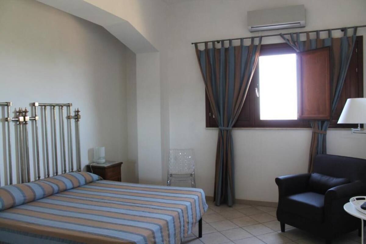 Desk, blackout curtains, free WiFi, bed sheets