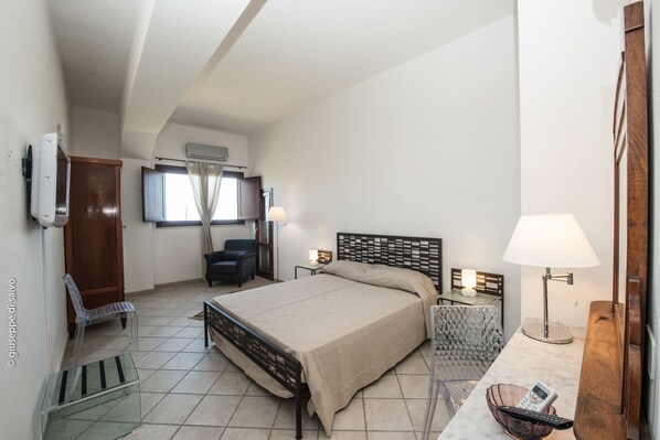 Desk, blackout curtains, free WiFi, bed sheets