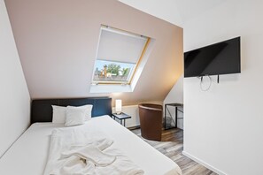 Habitació individual | Escriptori, wifi gratuïta i roba de llit 