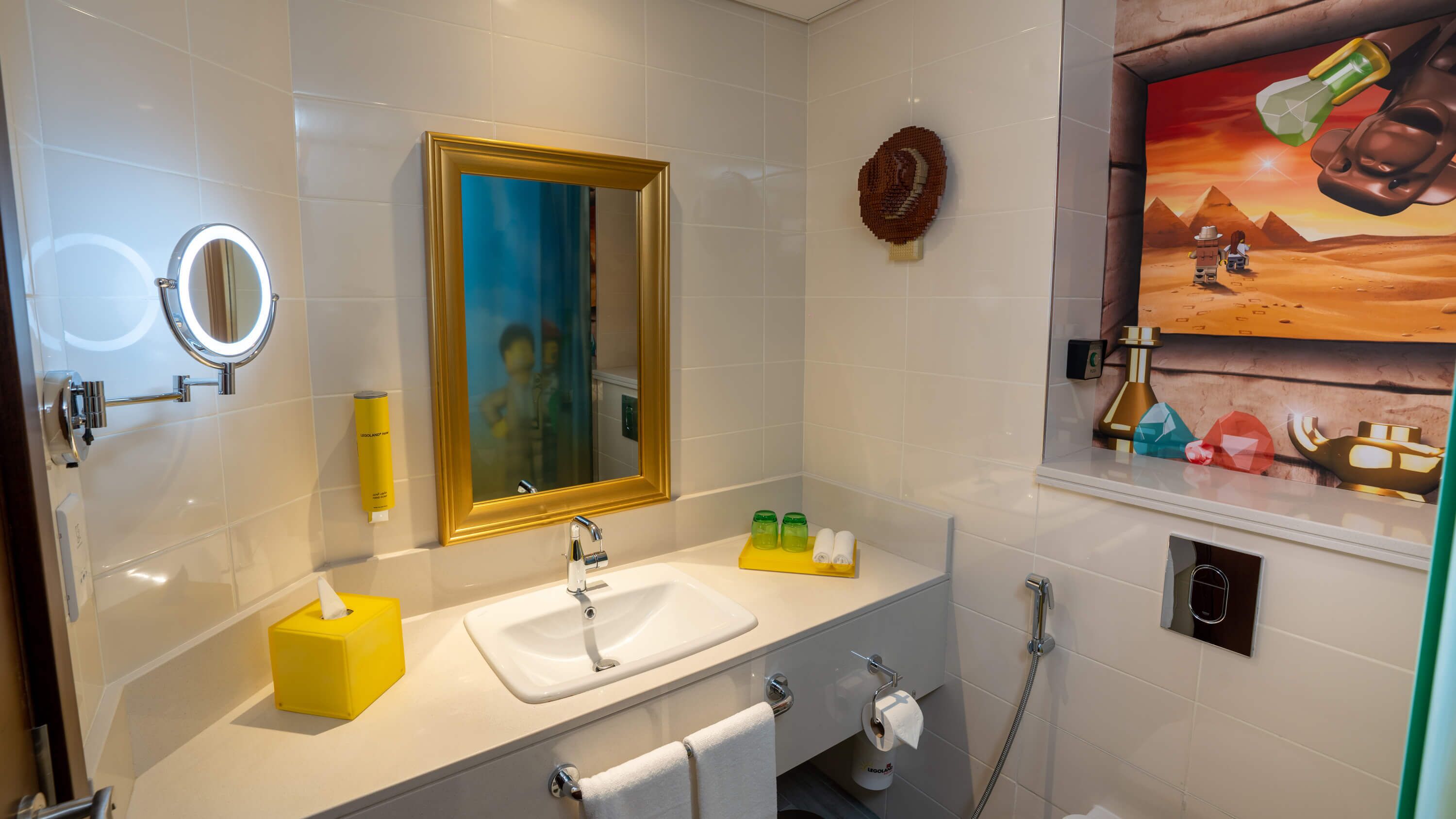 adventure fully themed room with park access | bathroom | free toiletries, hair dryer, slippers, towels