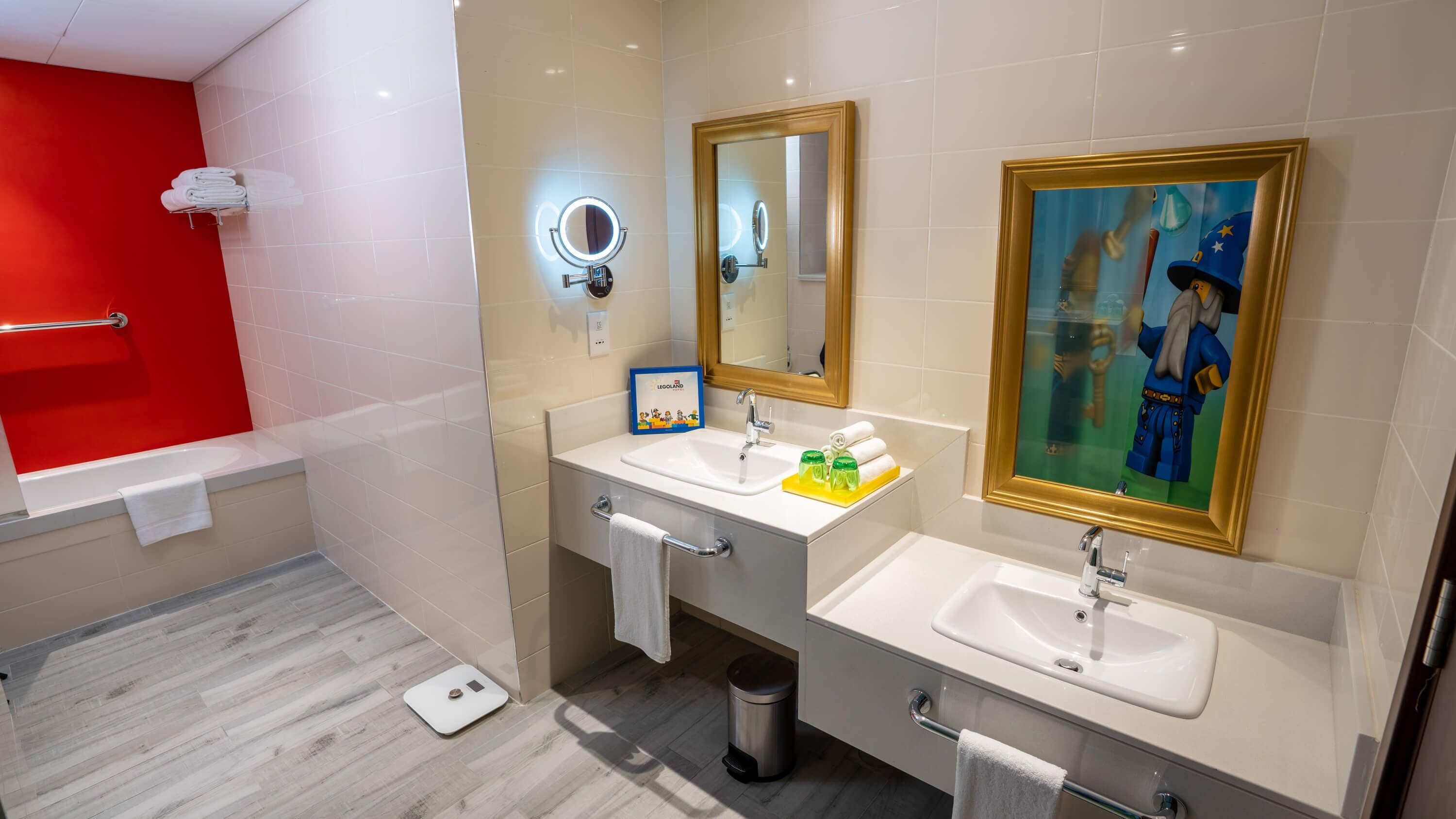 kingdom fully themed family suite with park access | bathroom | free toiletries, hair dryer, slippers, towels