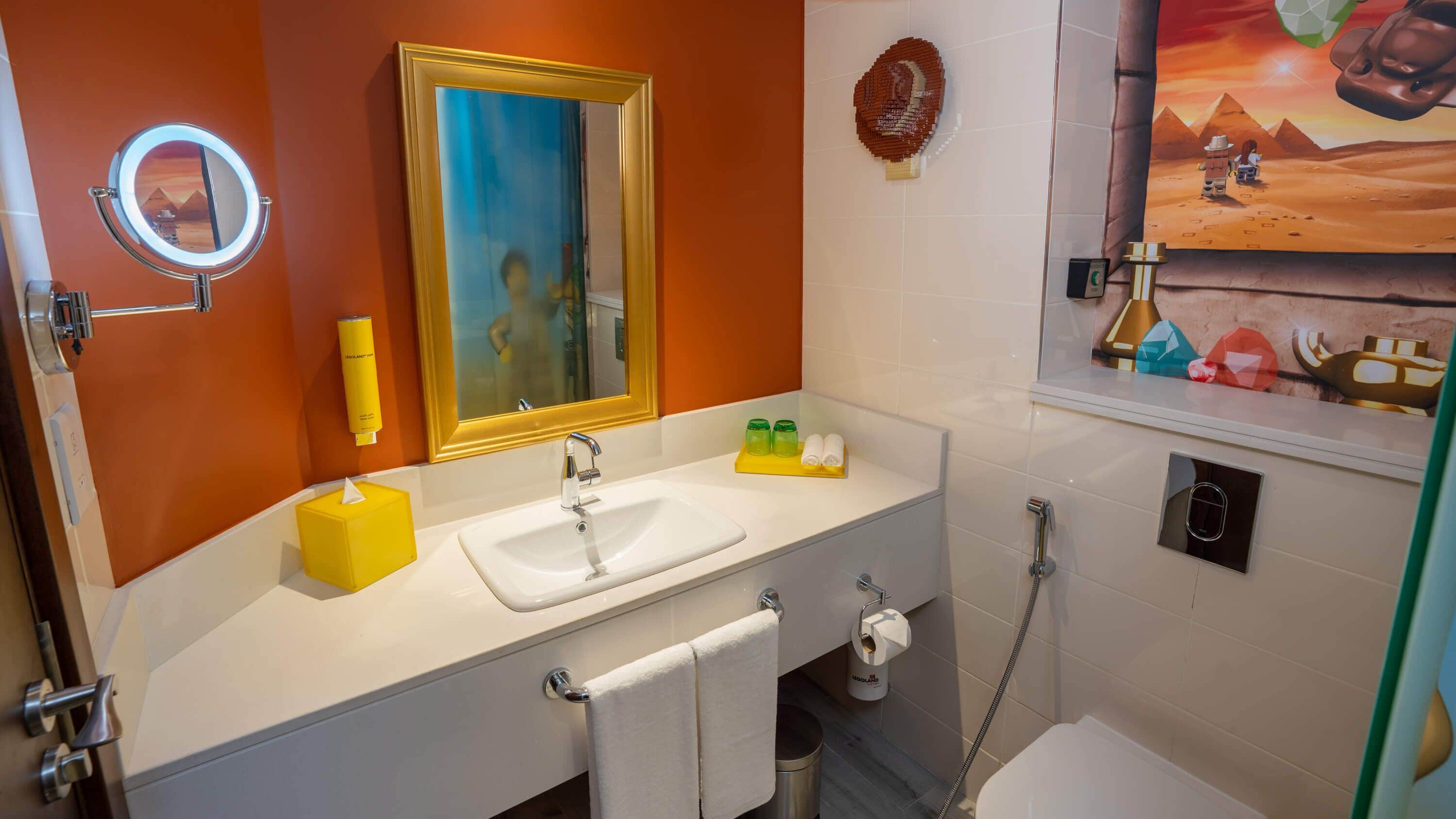 adventure themed room with park access | bathroom | free toiletries, hair dryer, slippers, towels