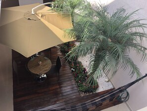 Premium Studio Suite, 1 King Bed, Air conditioning, Garden View | Garden view - Pousada da Paz (Curitiba)