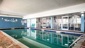 An indoor swimming pool with clear water, marked depth levels, and a blue tiled border. - Water's Edge 1511 - Two Bedroom, Two Bathroom, Oceanfront Condo (Garden City Beach)