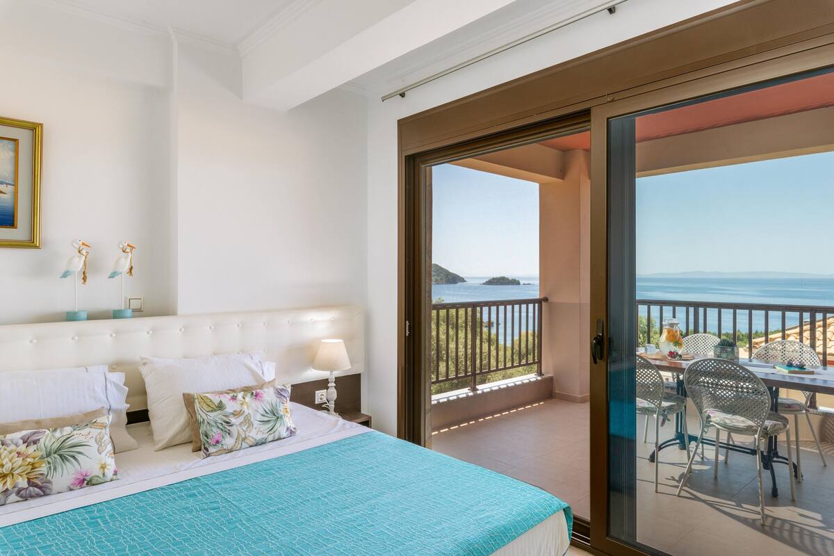 Apartment, 1 Bedroom, Sea View | In-room safe, desk, laptop workspace, soundproofing