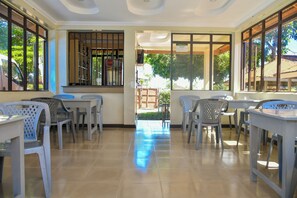 Breakfast, lunch, dinner served; local and international cuisine 