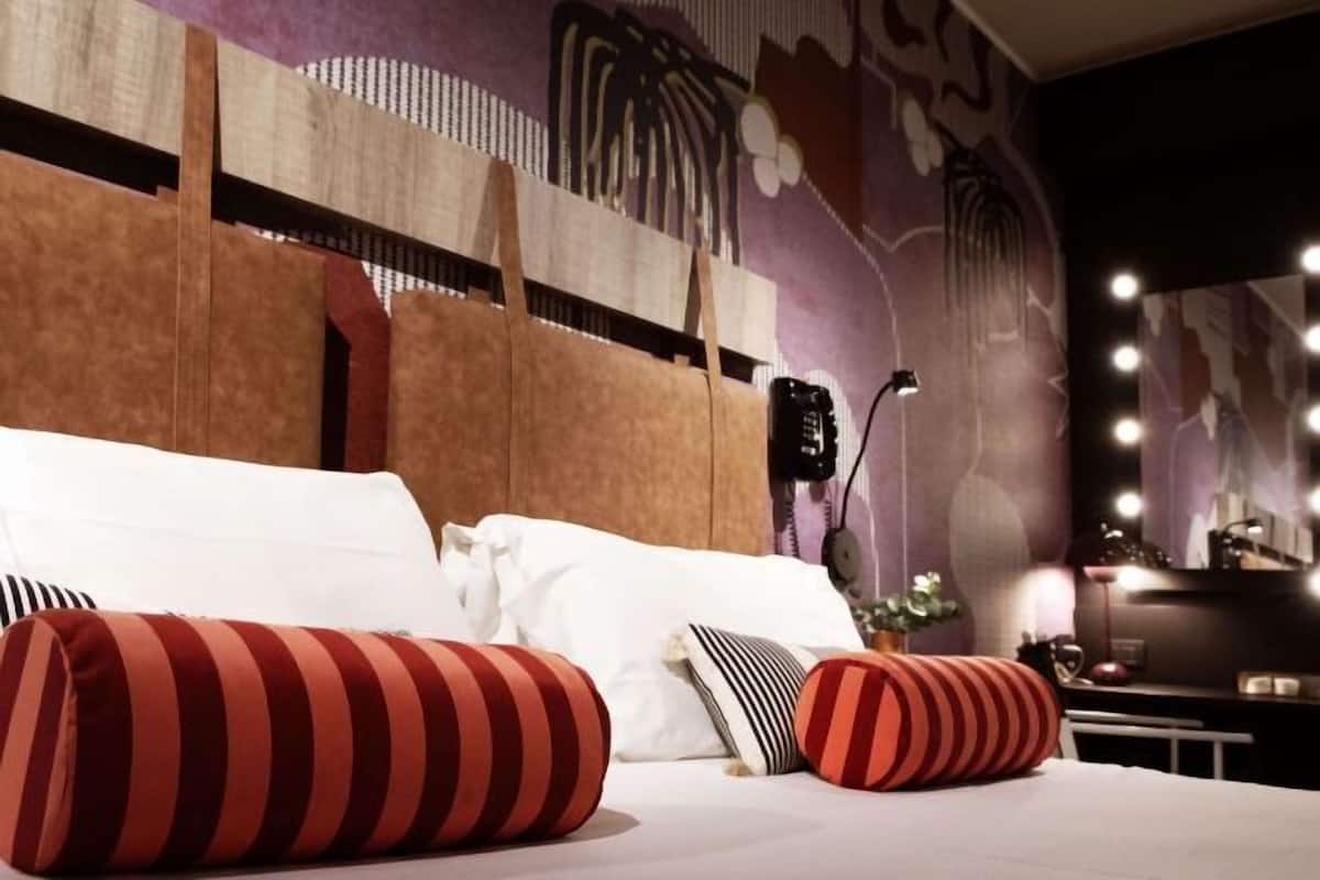 Down duvets, pillow-top beds, minibar, in-room safe