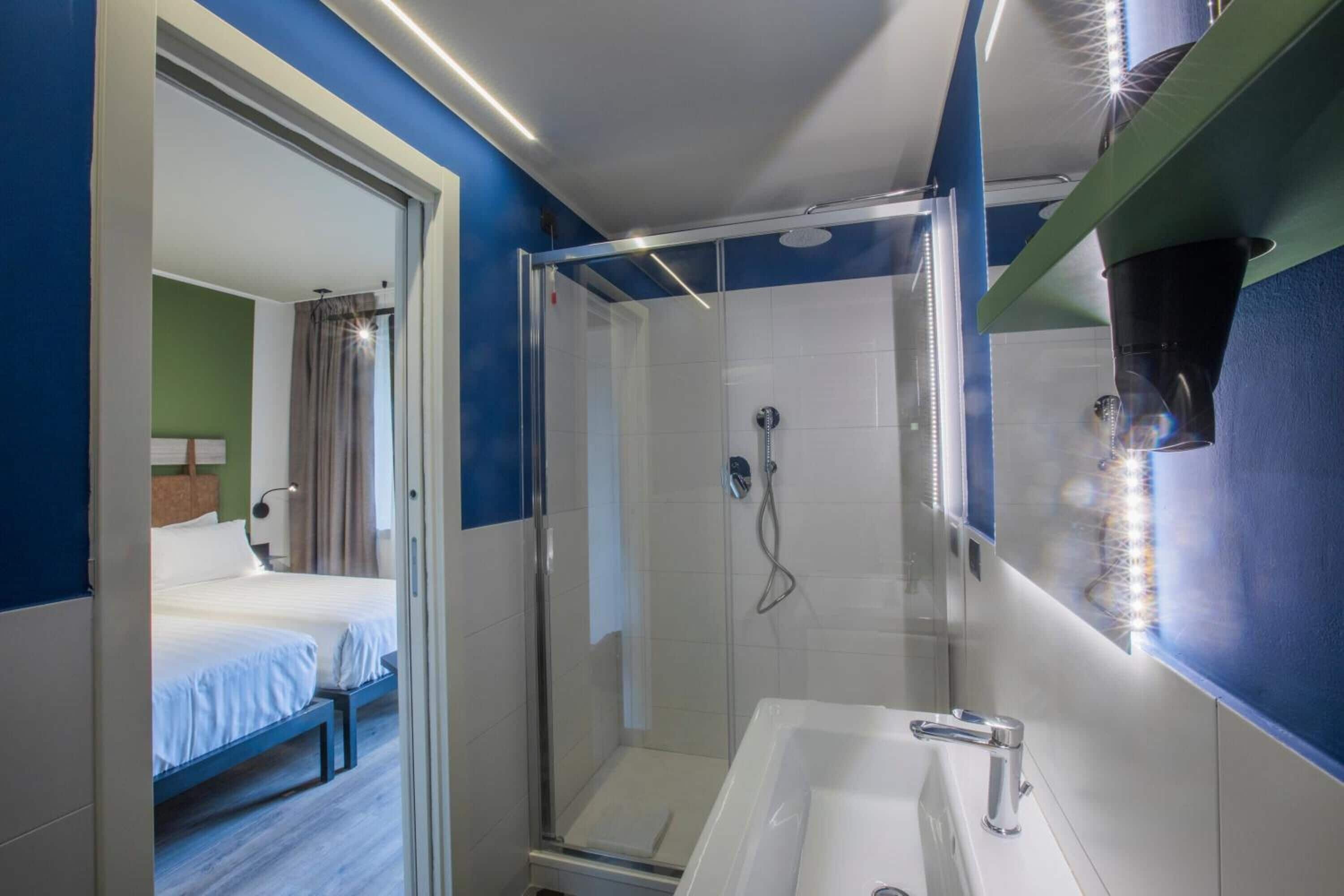 superior double or twin room, balcony | bathroom | shower, rainfall showerhead, eco-friendly toiletries, hair dryer