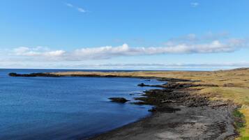 Private beach, black sand