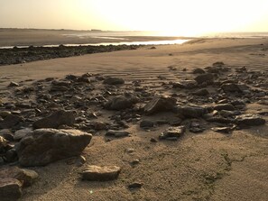 Una playa cerca, arena blanca, pesca