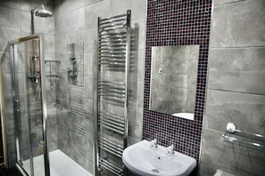 Bathtub, hair dryer, heated floors, towels