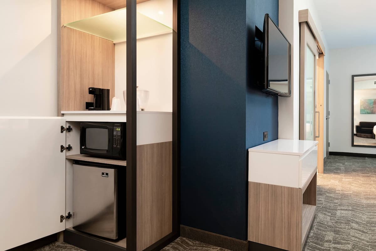 premium bedding, desk, laptop workspace, blackout curtains