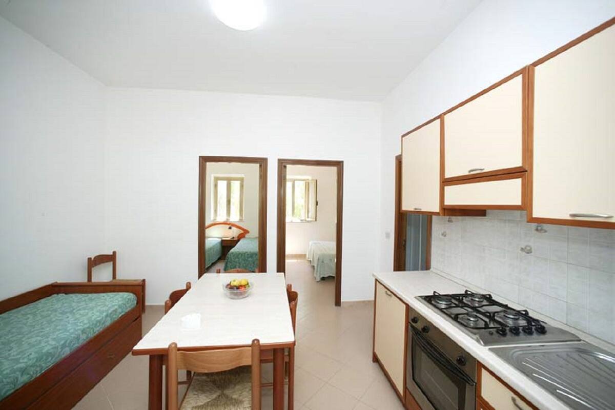 Apartment, 2 Bedrooms (trilocale) | Private kitchen | Full-sized fridge, stovetop, freezer